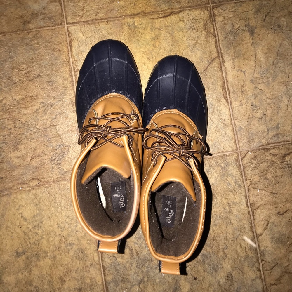 Navy and tan duck boots from rue 21